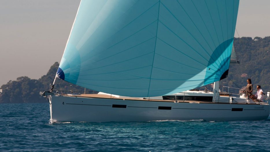 2017 Beneteau 45 side of boat with sails